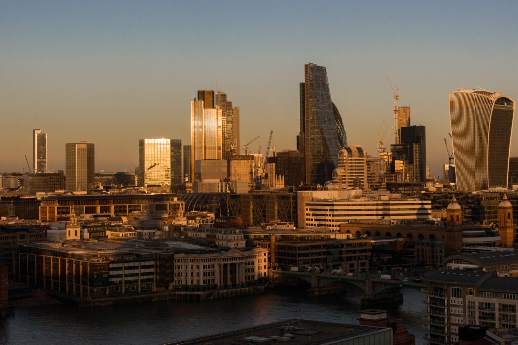 A view of London with many tall buildings and the Thames