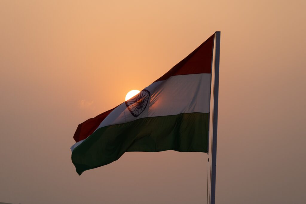 A Indian flag flying in the wind